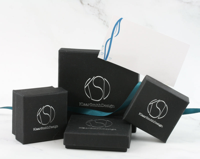 My jewellery boxes every piece of jewellery is packaged in together with a gift tag.