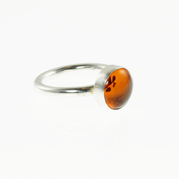Eco silver round ring band with an Amber gemstone.