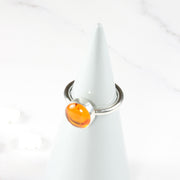 Eco silver round ring band with an Amber gemstone.