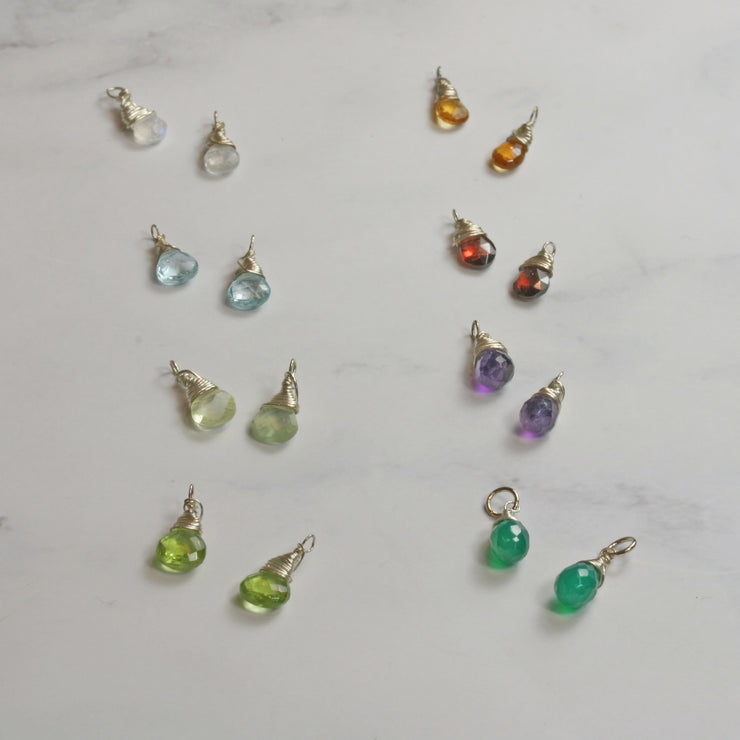 A selection of all available briolette gemstones set in a handmade silver wire setting. To add onto the hoop earrings, available on their own, in sets of two or three, and combined with hoop or twisted hoop earrings.