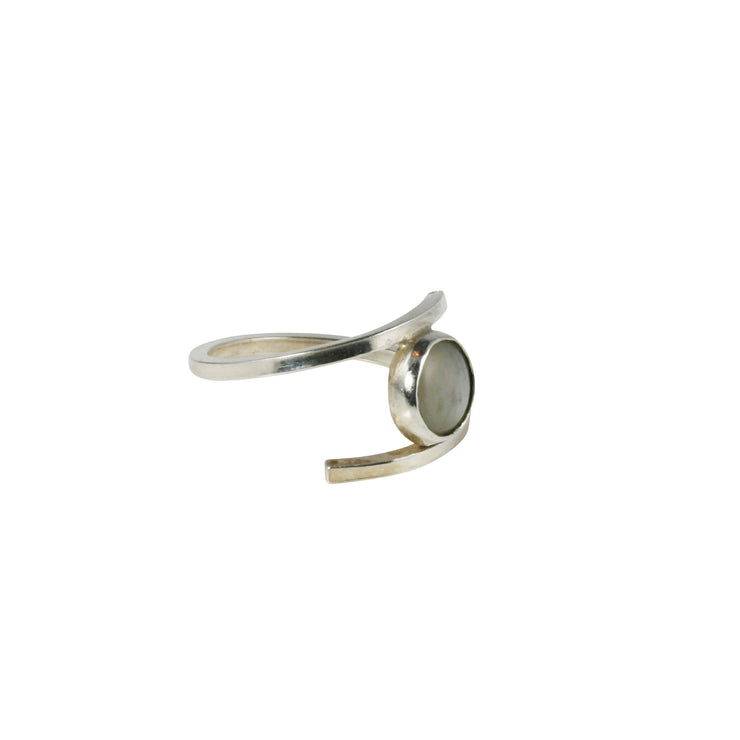 Eco silver square ring band holding a Grey Moonstone between both ends. The Moonstone is attached to the ring on one side making it adjustable and very comfortable to wear.