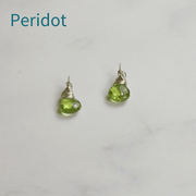 Peridot briolette gemstones set in a handmade silver wire setting. To add onto the hoop earrings, available on their own, in sets of two or three, and combined with hoop or twisted hoop earrings.