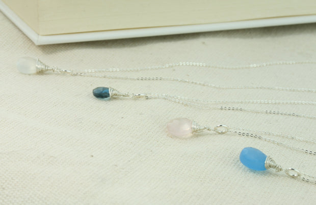 Silver briolette pendant necklaces with various gemstones.
