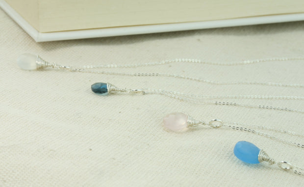 Silver briolette pendant necklaces with various gemstones.