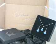 Silver briolette set with a pendant necklace and earrings with Blue Chalcedony faceted heart gemstone.