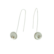Eco silver drop cup earrings with 9ct gold ball. The drop hook and cup are made from eco silver. The cup has been given a vertical stripe texture and a mirror finish. The gold ball sits in the bottom half of the cup.