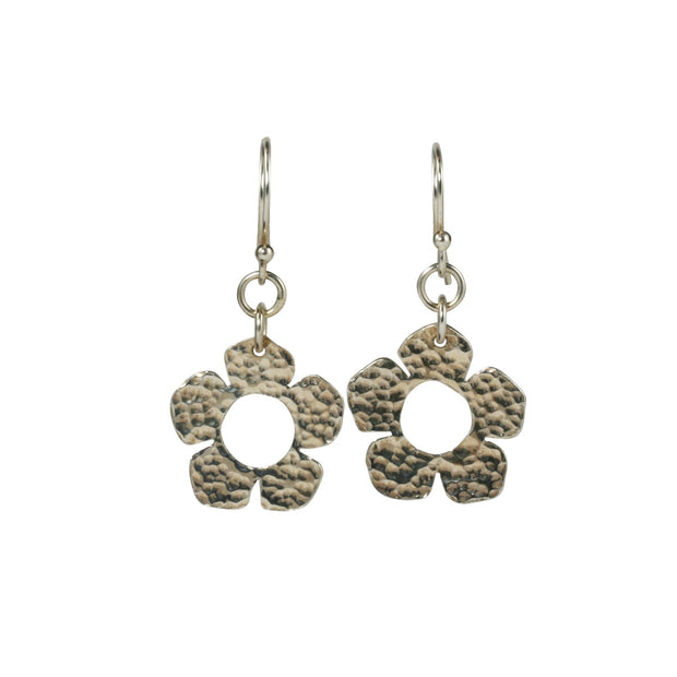 Silver hook earrings featuring a flower shape with 5 petals each and a hammered shiny finish at the front and a mirror finish at the back.