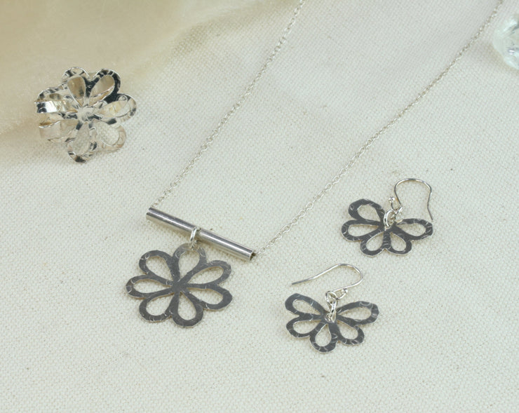 Silver flower with round leaves set of pendant necklace, hoop earrings and adjustable statement ring.