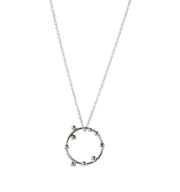 Silver hoop pendant featuring 9 silver balls. This is a handmade pendant, made form eco-silver. The trace chain necklace can be fastened with its lobster clasp at either 45cm or 50cm.