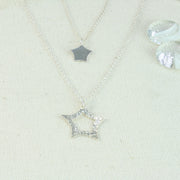 et of the silver quirky star pendant necklace and the rounded star pendant necklace.