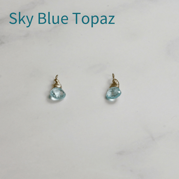 Sky Blue Topaz briolette gemstones set in a handmade silver wire setting. To add onto the hoop earrings, available on their own, in sets of two or three, and combined with hoop or twisted hoop earrings.