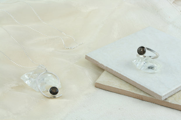 Eco silver swirl pendant necklace with Smoky Quartz gemstone and eco silver twisted ring with Smoky Quartz gemstone.