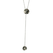 Silver y necklace featuring two split circles. They are domed circles split in half and soldered together with the domes pointing in opposite directions. The chain slides through the top split circle to adjust the length.